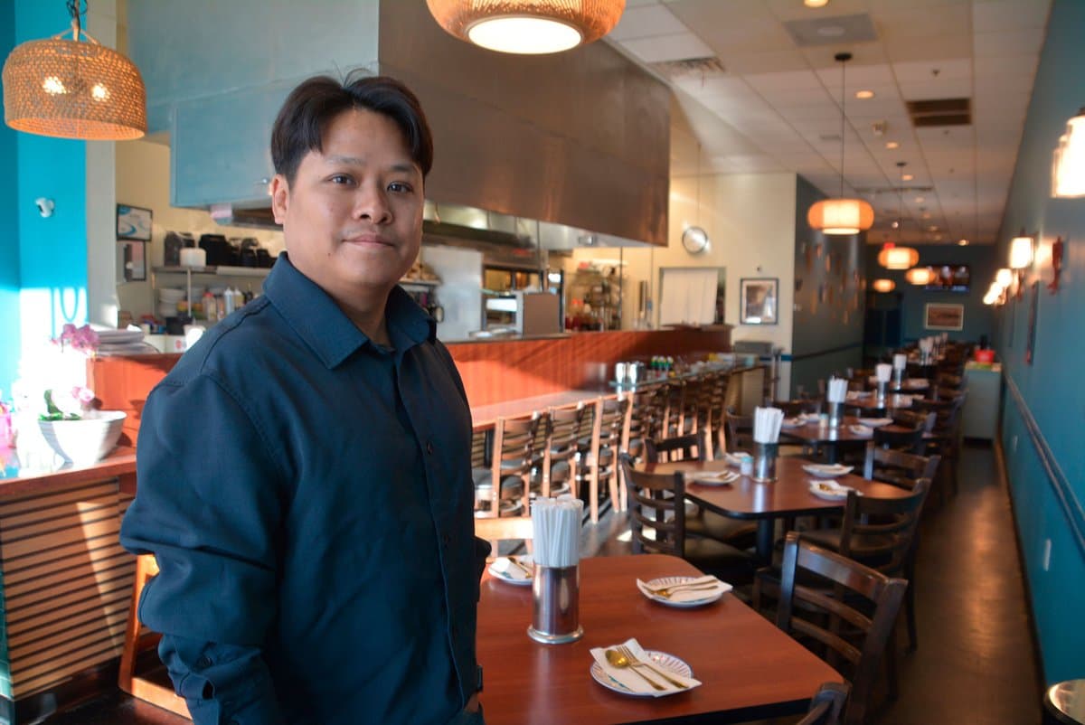 Nop Sac-Uang standing inside Senlek Thai Rice & Noodles in Hoover.